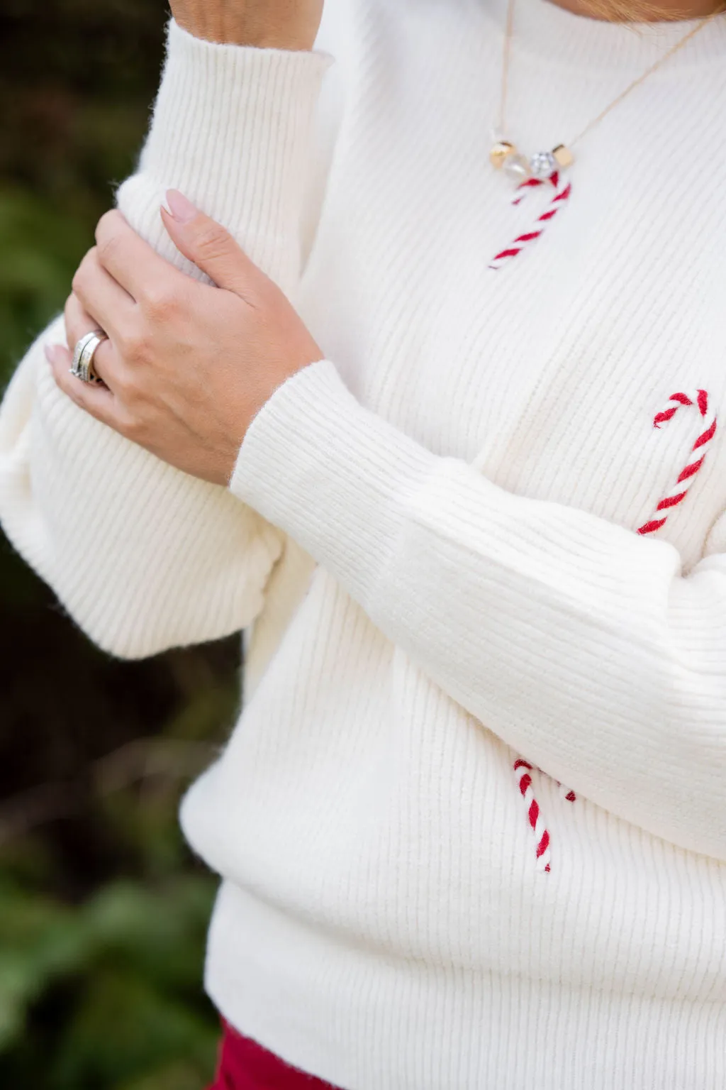 Stitched Candy Canes Sweater